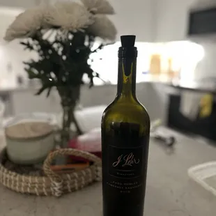 a bottle of wine on a table