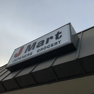 a sign on the roof of a store