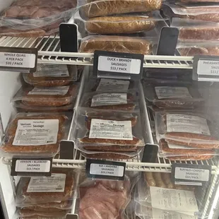 a display of meats and sausages