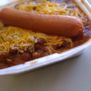 J N J Chili hotdog over rice Small portion so good! Best chili on this planet!
