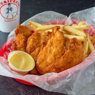  a basket of fried fish and fries