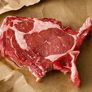 a piece of beef on a piece of brown paper