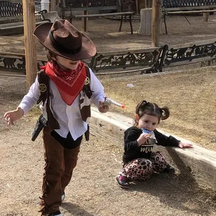 My babies having the time of their life! My son HAD to dress like a cowboy lol