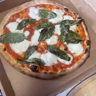 Margherita 
Whole mozz, basil, drizzle of olive oil