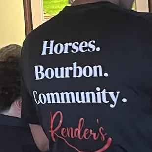 the back of a man in a black shirt