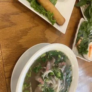 Pho with steak and fried egg rolls