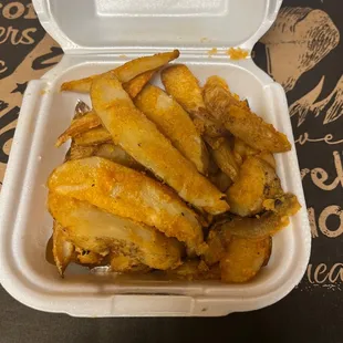 french fries in a styrofoam container