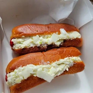 two hot dogs in a box