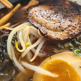 a close up of a bowl of ramen