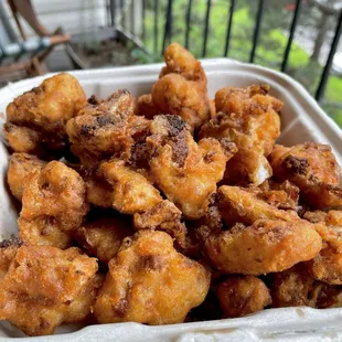 Wings (crispy fried cauliflower) (vegan) -- note: if you get it to-go they look like this without sauce (sauce packed separately) $14.00