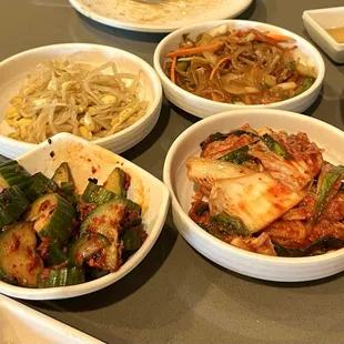 Banchan: Kimchi (so good!), cucumber kimchi (not so good), Japchae (yummy) and bean sprouts (no flavor)