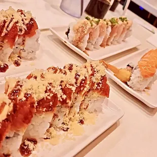 Salmon on California Roll Oh My Garlic Roll Red Dragon Roll