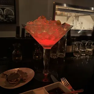Ooeeeahe Washingron Oysters served in a glass. With Serrano soy fiber Serrano ponzu sauce . OMG