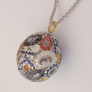 pave fancy sapphires and diamonds EGG necklace with pave diamonds in letters and symbols