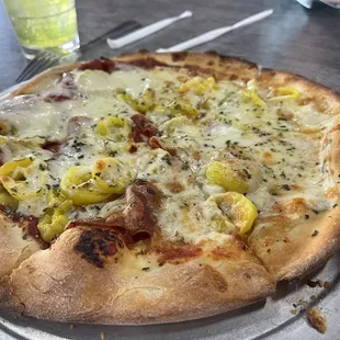 Small pepperoni and banana pepper pizza