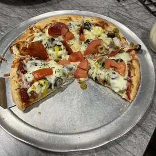 Veggie supreme &amp; added pepperoni on half