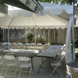 Tent, tables, and chairs from JV &amp; A (high skool grad gathering)