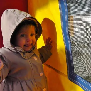 even the little ones enjoy playing  in bounce house