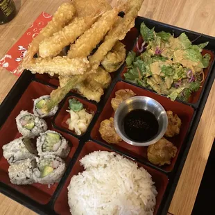 Shrimp and veggie combo tempura bento box. Tempura, salad, shrimp shumai, rice, California roll