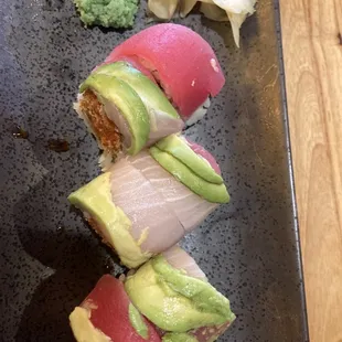 Tokyo roll - spicy tuna tempura inside, yellowtail, avocado outside