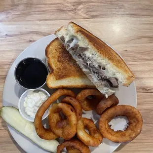Pot roast grilled cheese and onion rings.