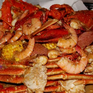 crab legs, corn, and sausage