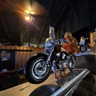 a man sitting on a motorcycle