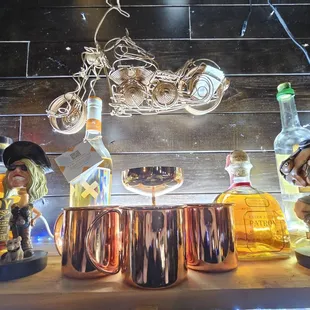 bottles of whiskey and miniature figurines