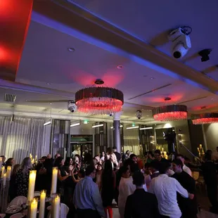 a crowd of people at a party