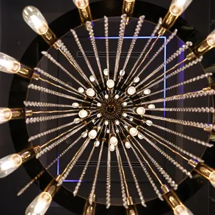 a circular chandelier with lights
