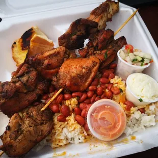 Chicken kabobs, beans and rice. SO GOOD!