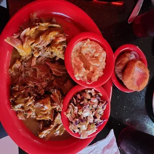 Brisket, pulled pork, potato salad,  cole slaw, and sconuts.
