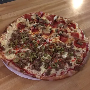 1/2 pepperoni and mushrooms and 1/2 beef and green olives