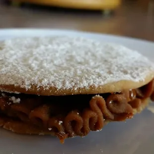 Alfajores - creamy caramel between soft powder-sugared wafers!