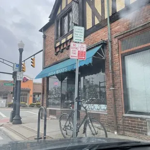 a bicycle parked in front of a building
