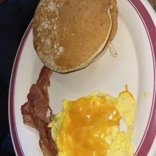 Hard eggs w/cheese like wax &amp; dry tasteless pancakes.