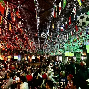 a crowd of people at a sports bar