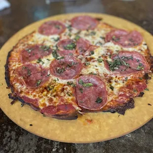 Honey bee with cauliflower first flatbread pizza
