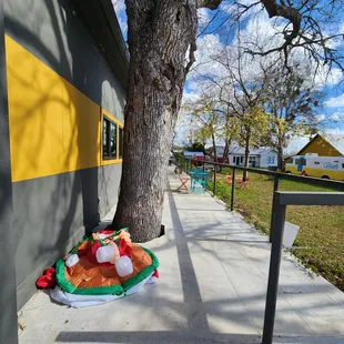 a stuffed turkey under a tree