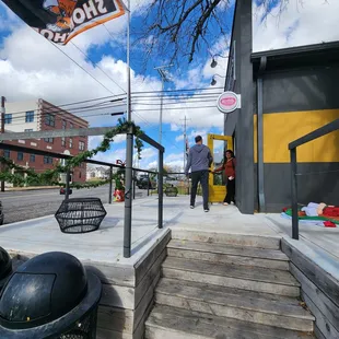 a man and a woman walking down a set of stairs