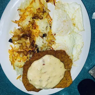 Country fried steak , w/sausage gravy 2 eggs