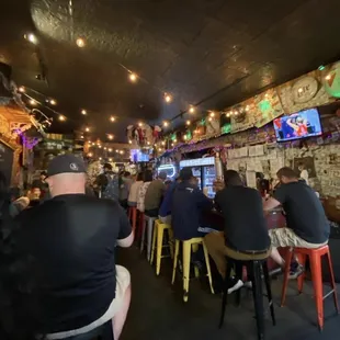 people sitting at the bar