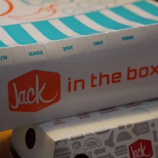 two boxes stacked on top of each other