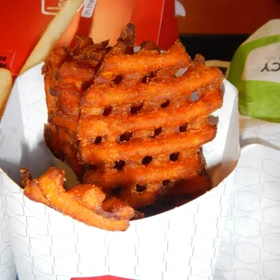 Five burnt sweet potato fries for $1.99.