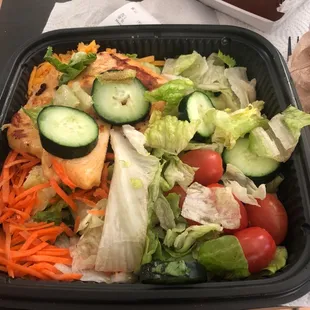 Grilled Chicken Salad with brown lettuce and cucumbers