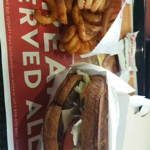 Sriracha burger and curly fries