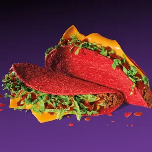 a taco with lettuce and cheese