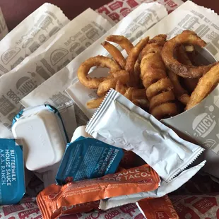 Tacos , curly fries and lots of hot sauce and ranch