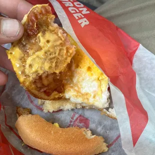 A single piece of bacon that isn't even cooked