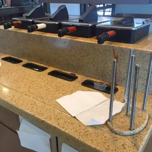 Discussing how much ketchup is all caked in and the ketchup chips is empty on both sides.